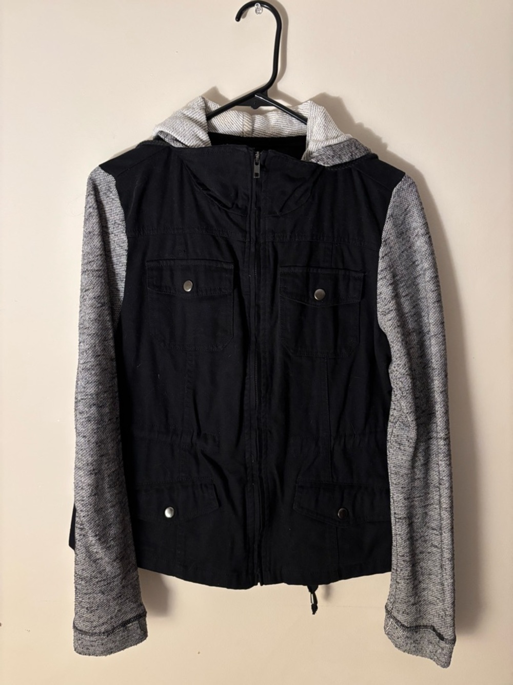 Black Jacket with pockets, hood, and gray contrast sleeves